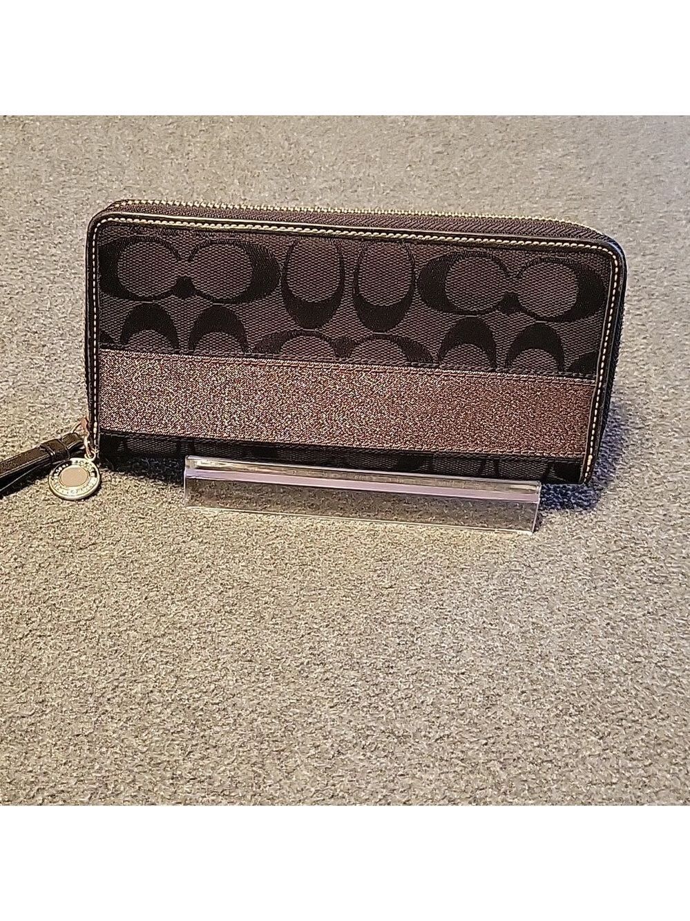 EUC Coach Legacy full zip wallet with glitter stripe
